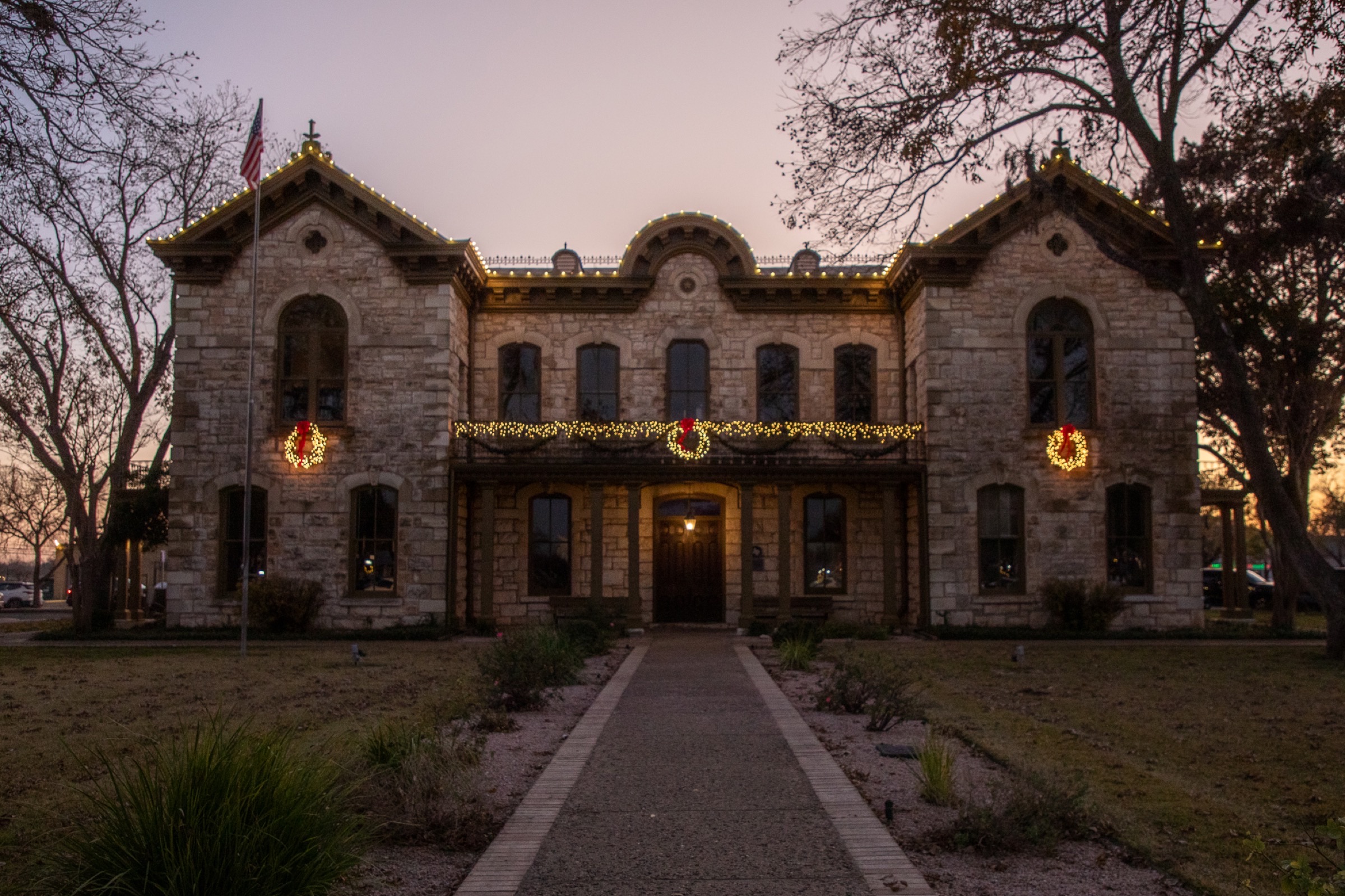 Architecture - historic stone courthouse at sunset